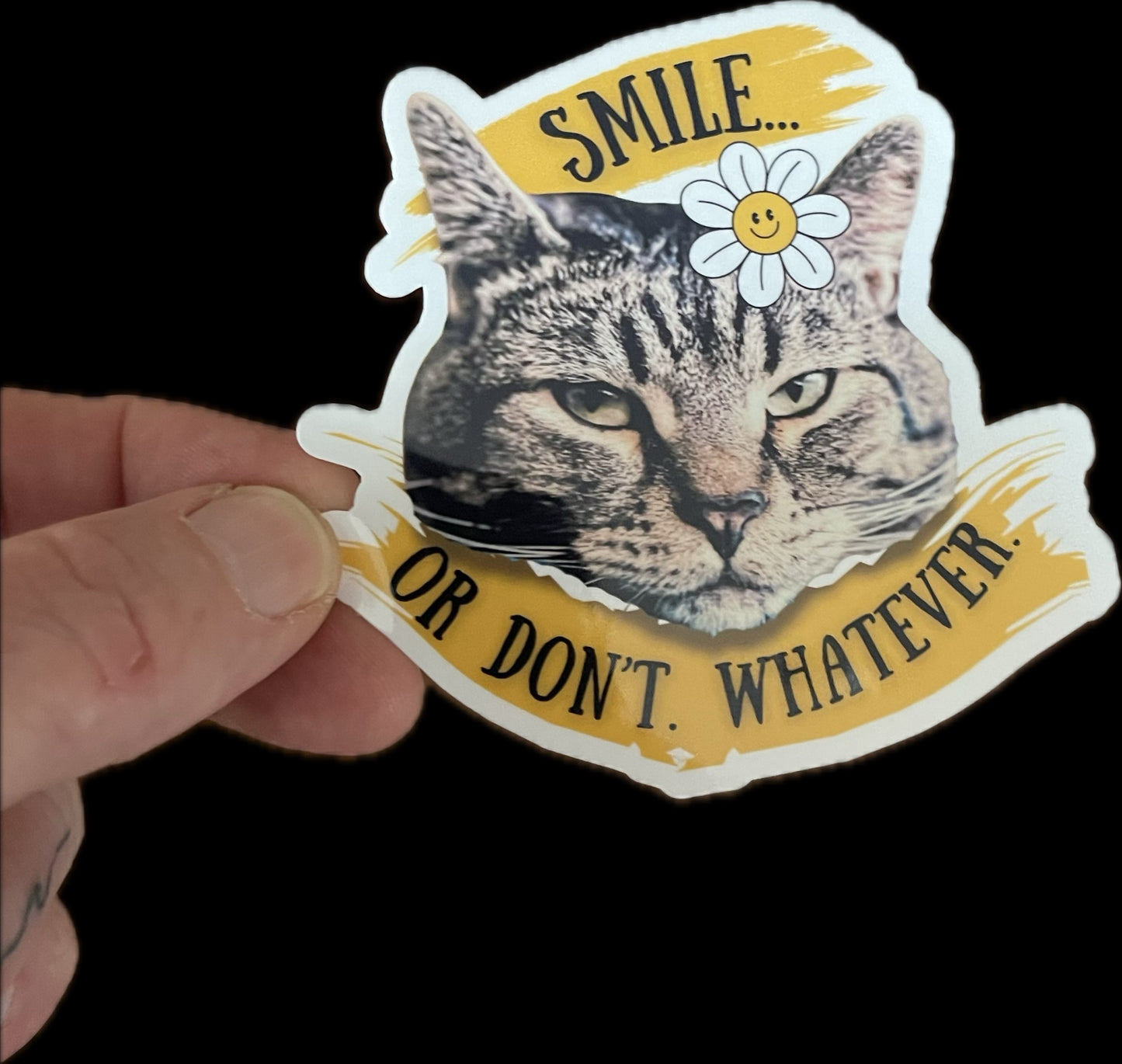 “Smile… or don’t. Whatever.” Sticker